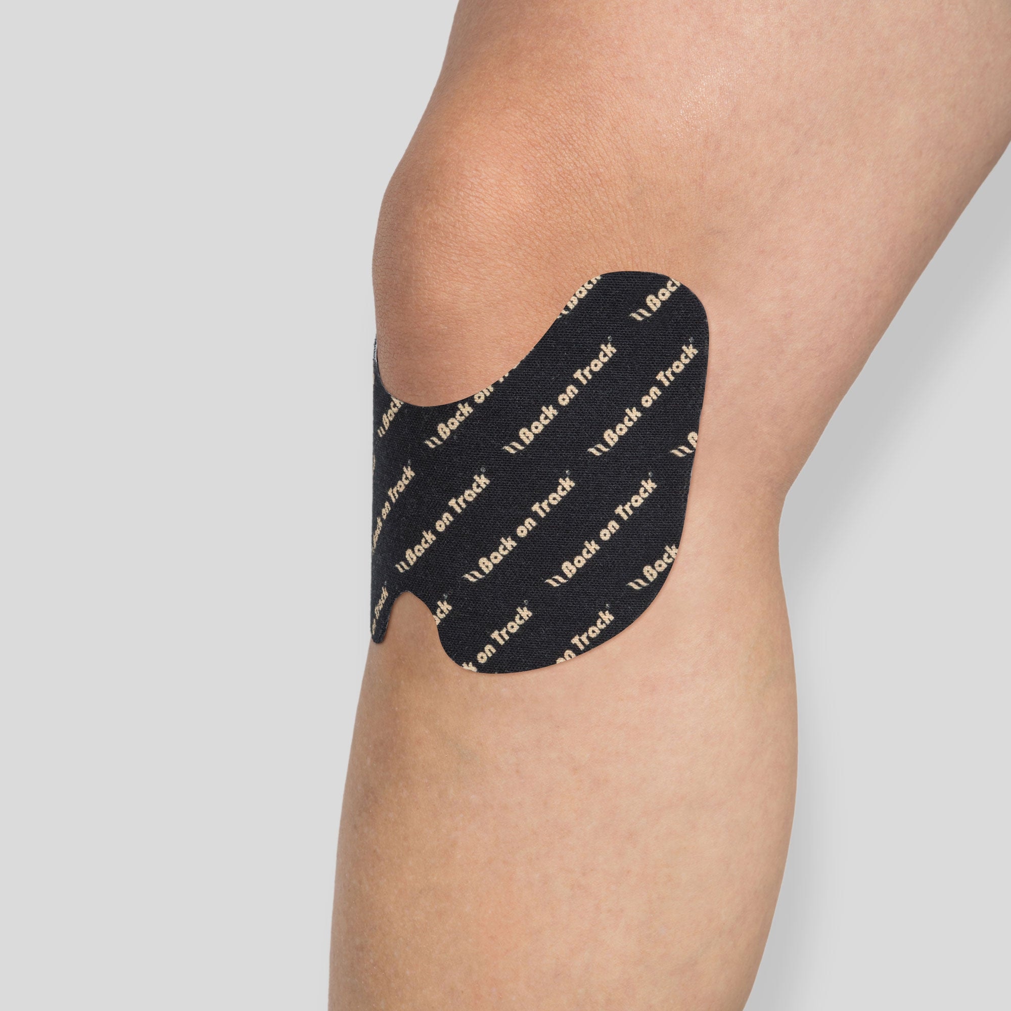 Welltex Butterfly-Tape unterhalb des Knies angelegt