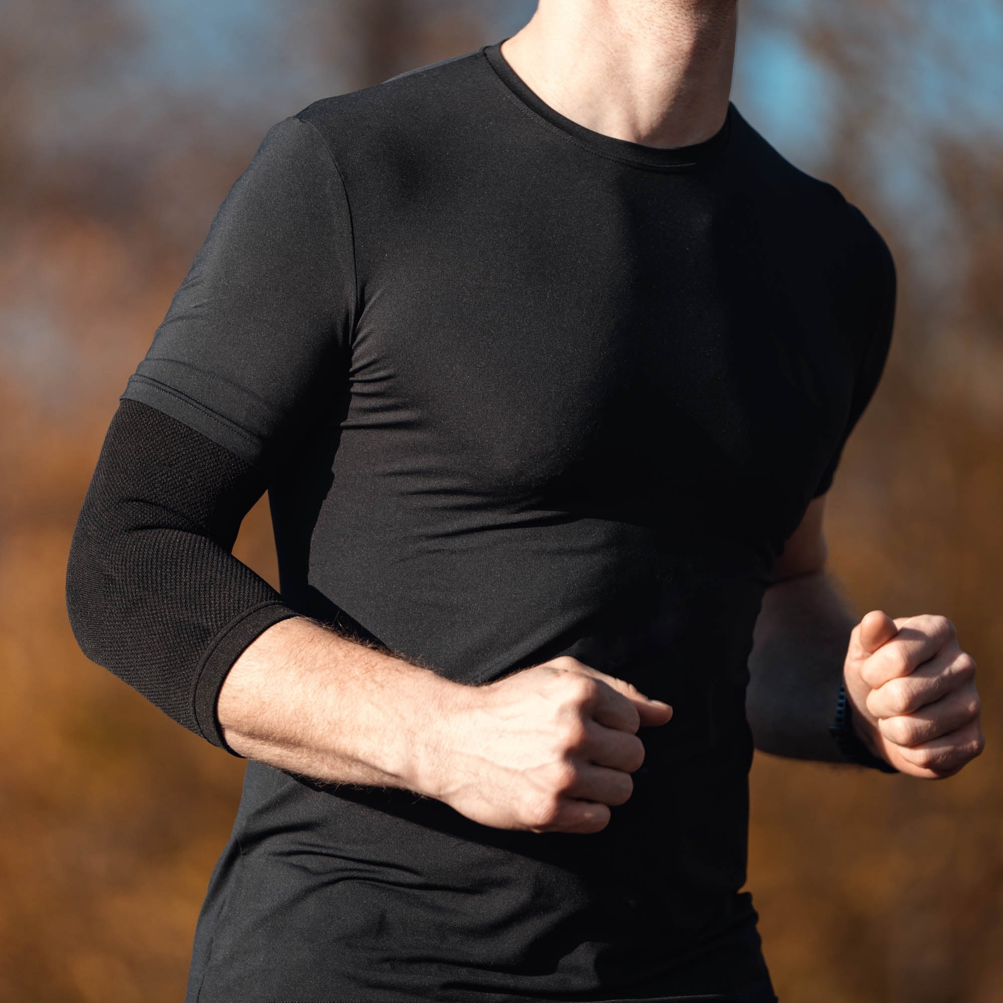 Physio 1207 am Arm eines Läufers im Freien